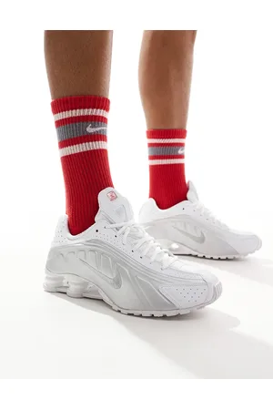 Nike Shox R4 trainers in and metallic silver