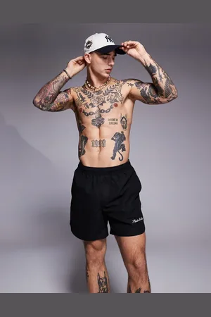 ASOS Swim shorts in mid length with embroidery placement in
