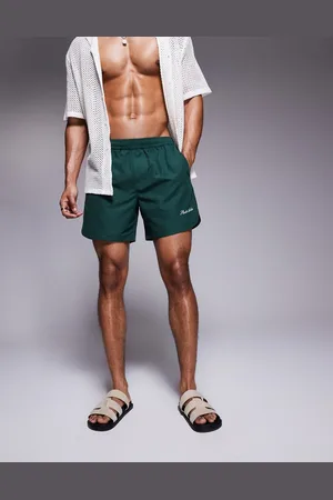 ASOS Swim shorts in mid length with embroidery in