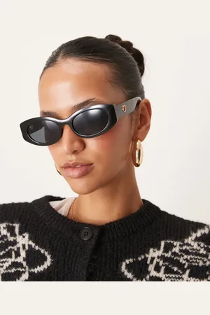 ASOS Oval sunglasses in with heart charm detail