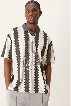 ASOS Oversized polo with sports graphic and all over print