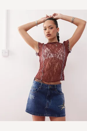 ED HARDY Swallow side wash low rise denim mini skirt in washed indigo