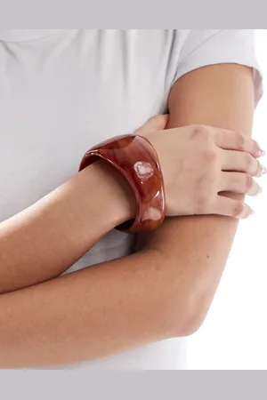 ASOS Bangle bracelet with abstract detail in amber