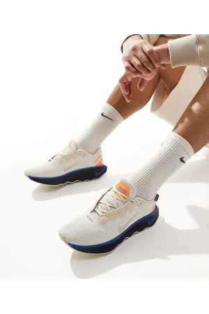 Nike Motiva GORE-TEX trainers in beige and blue