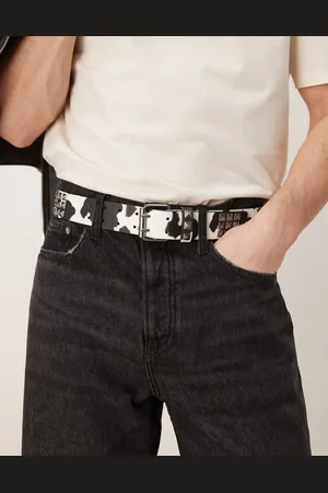 ASOS Cow print studded belt in faux leather