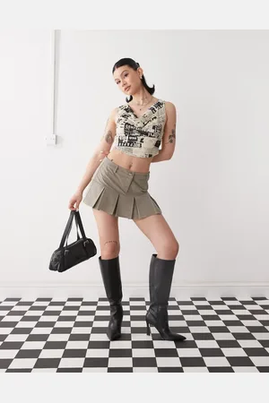 Motel Pegui mini box pleat cord skirt in soft