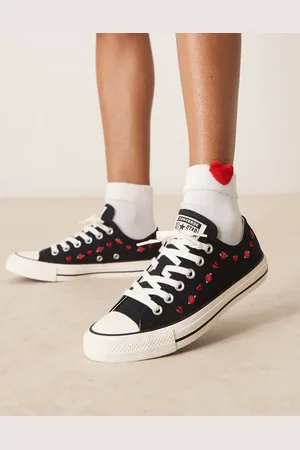 Converse Hearts Chuck Taylor Ox trainers in with roses