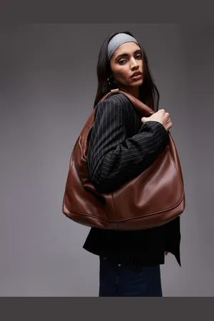 House of Sunny The big sling faux leather bag in brown