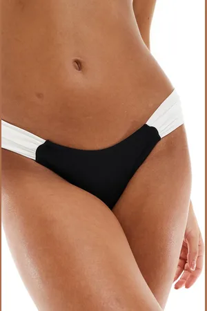 Free Society Ruched side contrast bikini bottom in black and cream