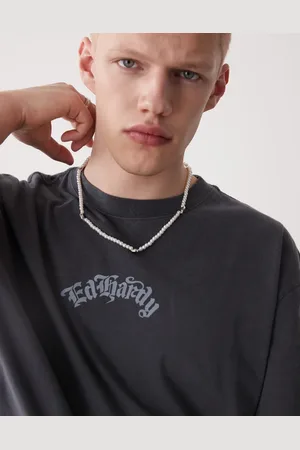 FADED FUTURE Pearl necklace with metal shell pendants in
