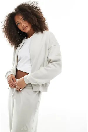 adidas Adidas Essentials contemporary logo bomber jacket in wonder alumina