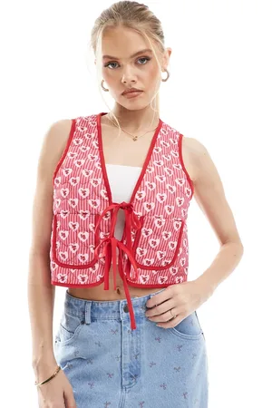 The Frolic Exclusive heart quilt reversible tie front waistcoat in floral and red stripe