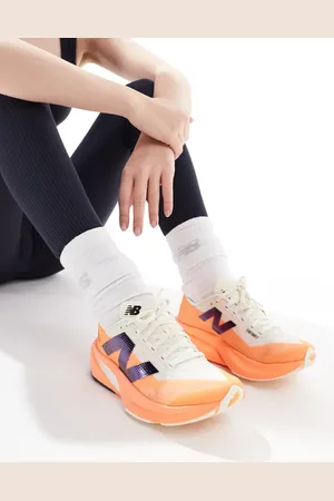 New Balance Fuel Cell Rebel V4 running trainers in
