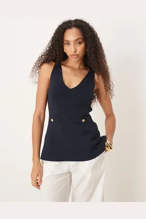 ASOS Knitted structured peplum top with lapels in navy