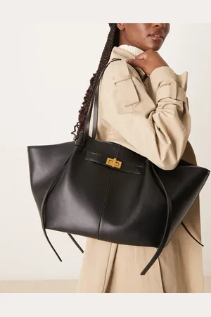 Gina Tricot Faux leather medium tote bag with strap and clutch detail in