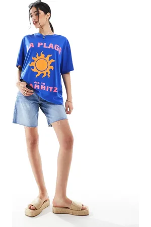 Bershka High waisted raw hem longline denim shorts in mid