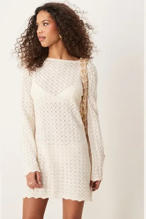 ASOS Knitted mini dress with flared sleeve in cream