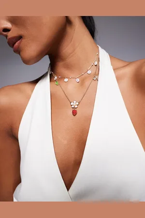 Aldo Veryberry daisy strawberry charm necklace in gold