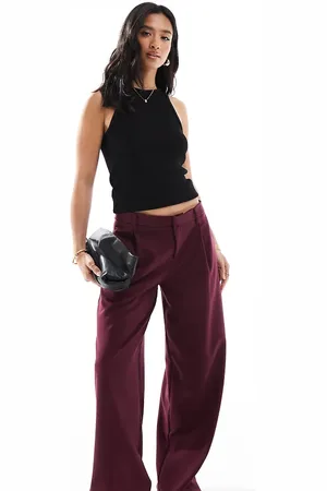 Bershka Petite low rise wide leg tailored trousers in burgundy