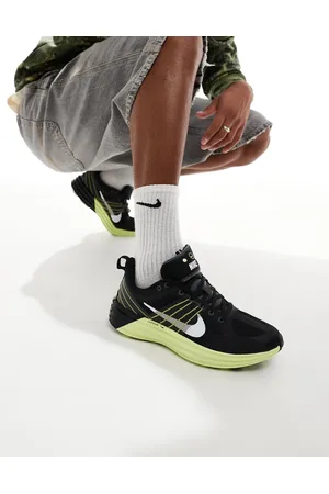 Nike Lunar Roam trainers in and yellow