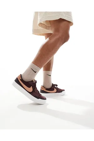 Nike SB Zoom Pogo Plus trainers in burgundy