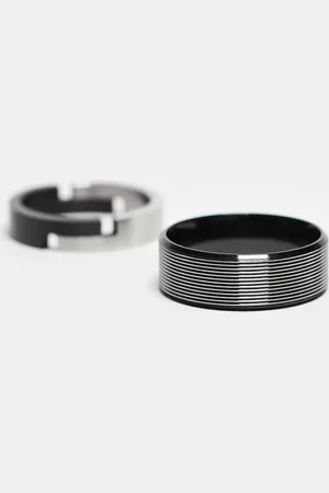 ASOS 2 pack waterproof stainless steel band rings with black trim detail in tone