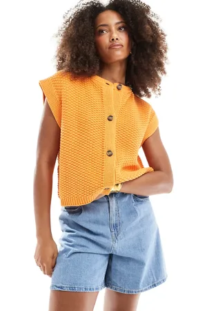 ASOS Boxy knitted stitch waistcoat with button detail in