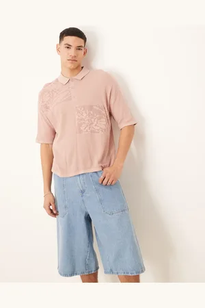 ASOS Relaxed boxy fit knitted polo with floral patchwork pattern in dusty