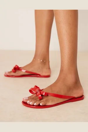 Glamorous Bow flip flops in