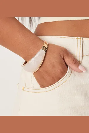 ASOS ASOS DESIGN Curve bangle bracelet with faux pearl insert in tone