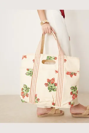 Free People Caravan canvas tote bag in strawberry print