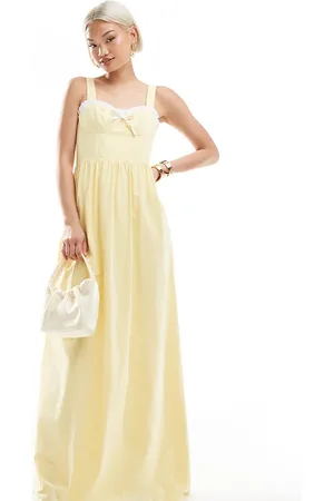 The Frolic Exclusive sweetheart contrast ruffle trim bow detail maxi dress in