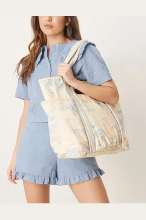 Free People Caravan canvas tote in toile print