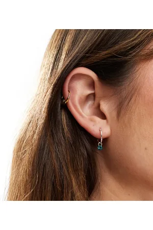 Kingsley Ryan Hoop earrings with bright blue crystal charm in sterling