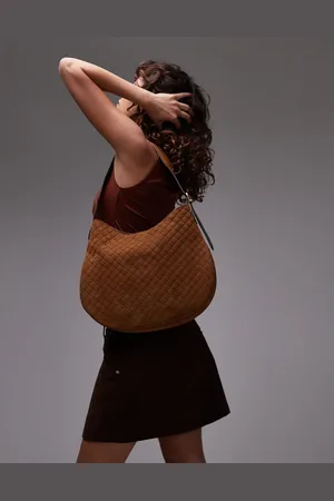 MANGO Embossed monogram leather bag in
