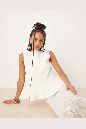 ASOS Knitted structured peplum top in cream
