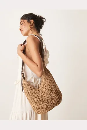 My Accessories Curved rafia shoulder bag with buckle strap in beige