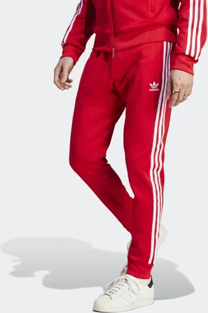adidas Adicolor classics sst track pants in better scarlet / white