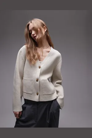 ARKET Knitted compact milano stich cardigan with pockets in beige
