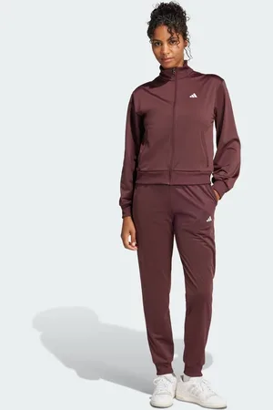 adidas Essentials feel cozy track suit in aurora ruby / brown