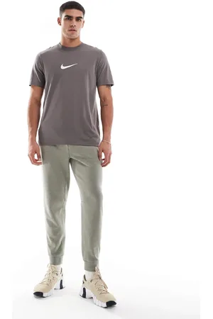 Nike Primary Dri-FIT joggers in grey