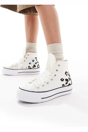 Converse Chuck Taylor All Stars Lift trainers in with leopard print detail