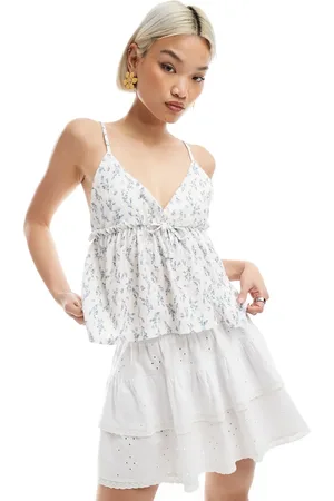 Miss Selfridge Bow detail peplum cami top in ditsy floral