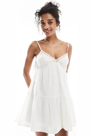 Bershka Strappy lace trim tiered mini dress in
