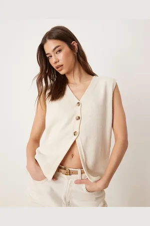 ASOS Clean knitted relaxed fit waistcoat in cream