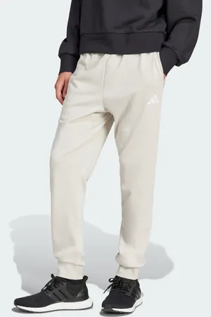 adidas Essentials feel cozy french terry pants in beige / white