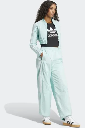 adidas Adicolor teamgeist oversized track pants in semi flash aqua