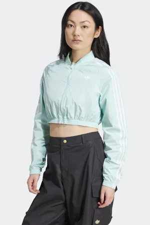 adidas Adicolor teamgeist cropped track top in semi flash aqua