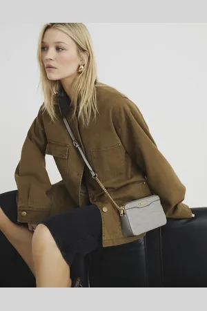 River Island Faux leather quilted cross body bag in