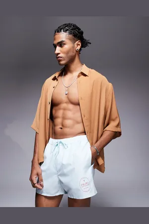 ASOS Swim shorts in short length in and white stripe